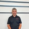 man wearing black polo shirt