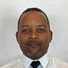 man wearing dress shirt and tie