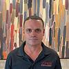 man wearing black polo shirt