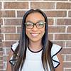 smiling woman wearing glasses
