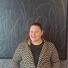 woman wearing jacket with zigzag pattern