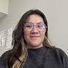smiling woman wearing glasses