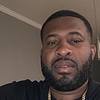 man with short hair and short beard