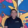man wearing black polo shirt