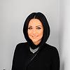 smiling woman with black hair and black clothes
