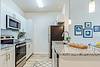 Apartment kitchen with stainless steel appliances