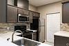 apartment kitchen with stainless steel appliances